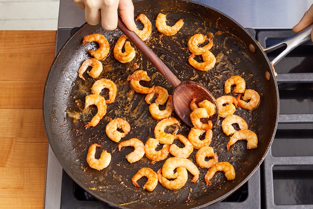 recipe-step-image-Cook the shrimp & serve your dish}